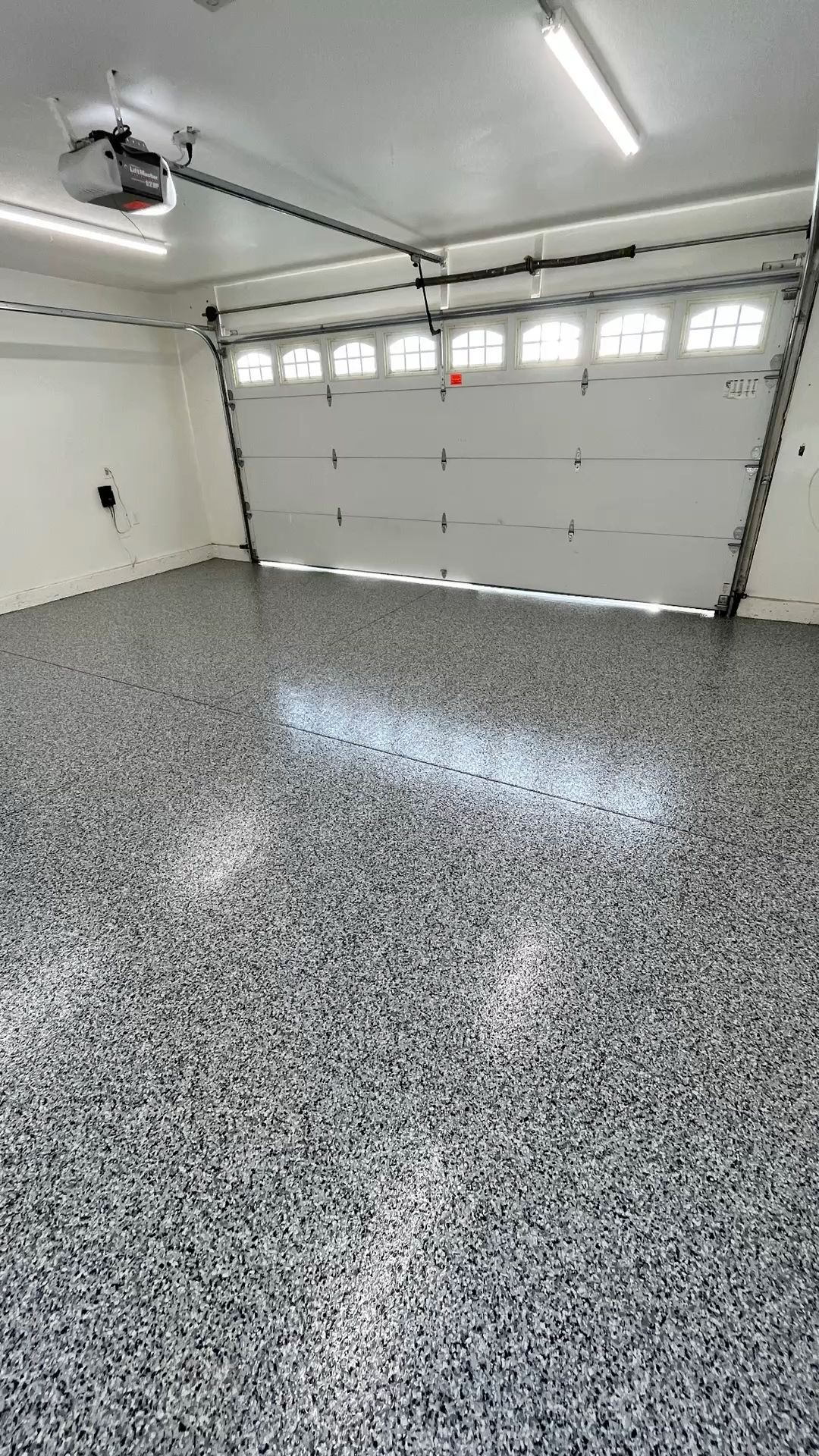 Garage epoxy flooring with flake finish completed in Brisbane